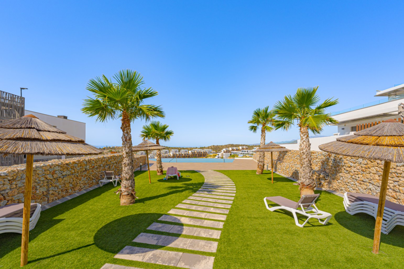 Luxury ground floor corner apartment with sea view, 106 m² terrace and garden in Seascape Resort.