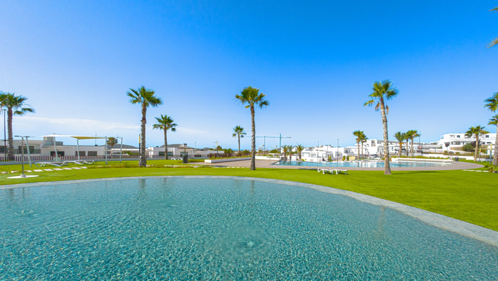 Luxury ground floor corner apartment with sea view, 106 m² terrace and garden in Seascape Resort.